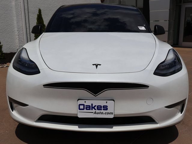 Used 2023 Tesla Model Y Long Range with VIN 7SAYGDEEXPA083328 for sale in Kansas City