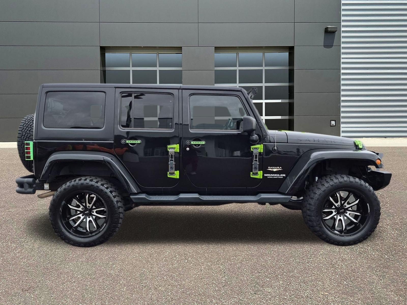 Used 2015 Black Clearcoat Jeep Sahara image 4
