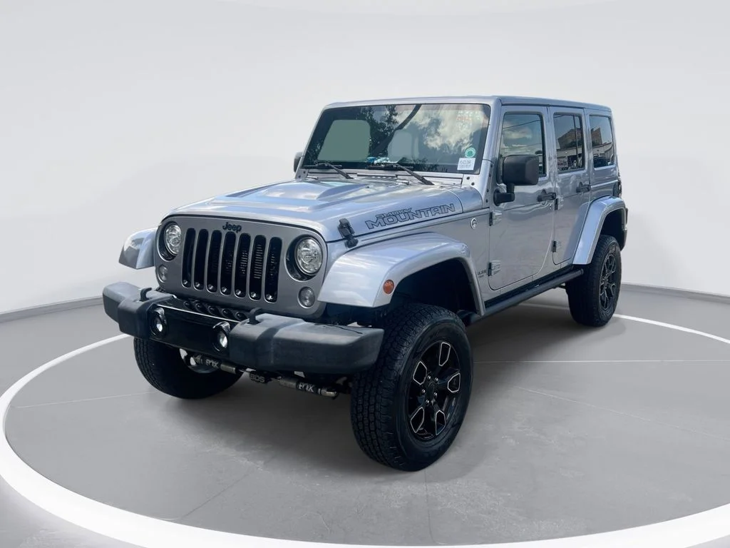 Used 2017 Silver Jeep Unlimited Sahara image 1