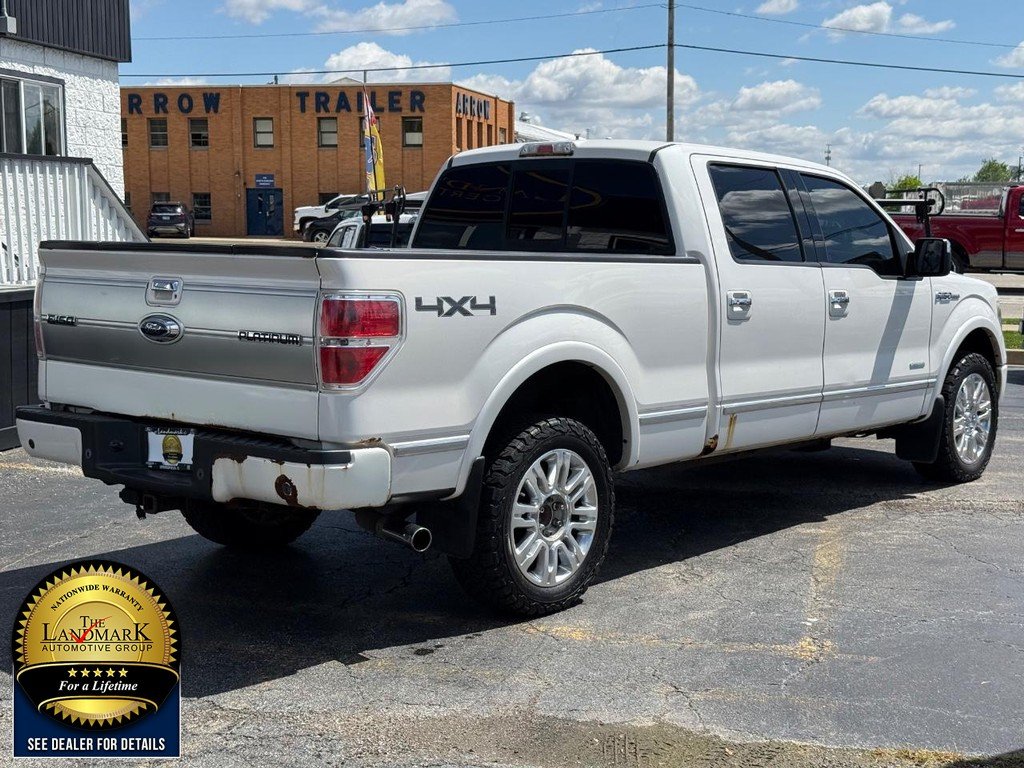 Used 2013 White Platinum Metallic Tri-Coat Ford 4WD SuperCrew 145" Platinum image 5