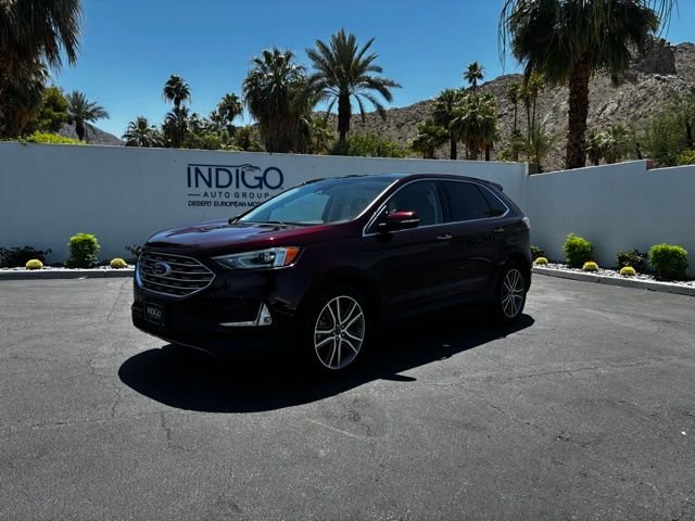 Used 2020 Burgundy Velvet Metallic Tinted Clearcoat Ford Titanium image 1