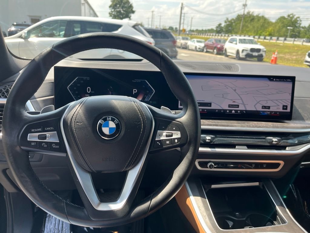 Certified Used 2024 Black Sapphire Metallic BMW xDrive40i image 13