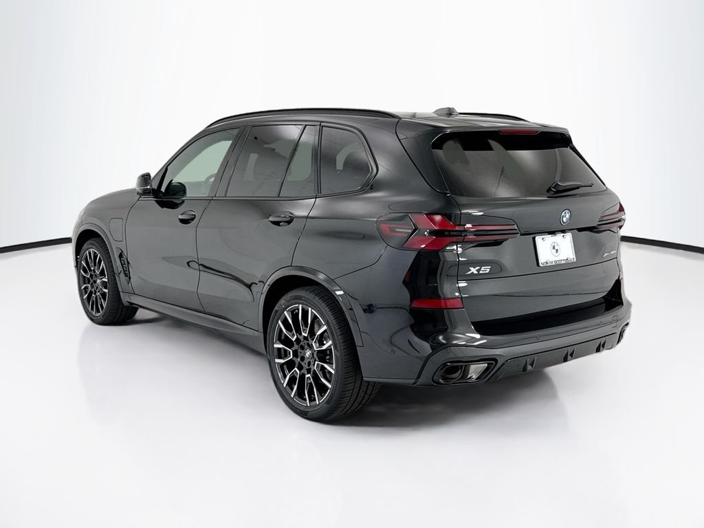 New 2026 Black Sapphire Metallic BMW xDrive50e image 7