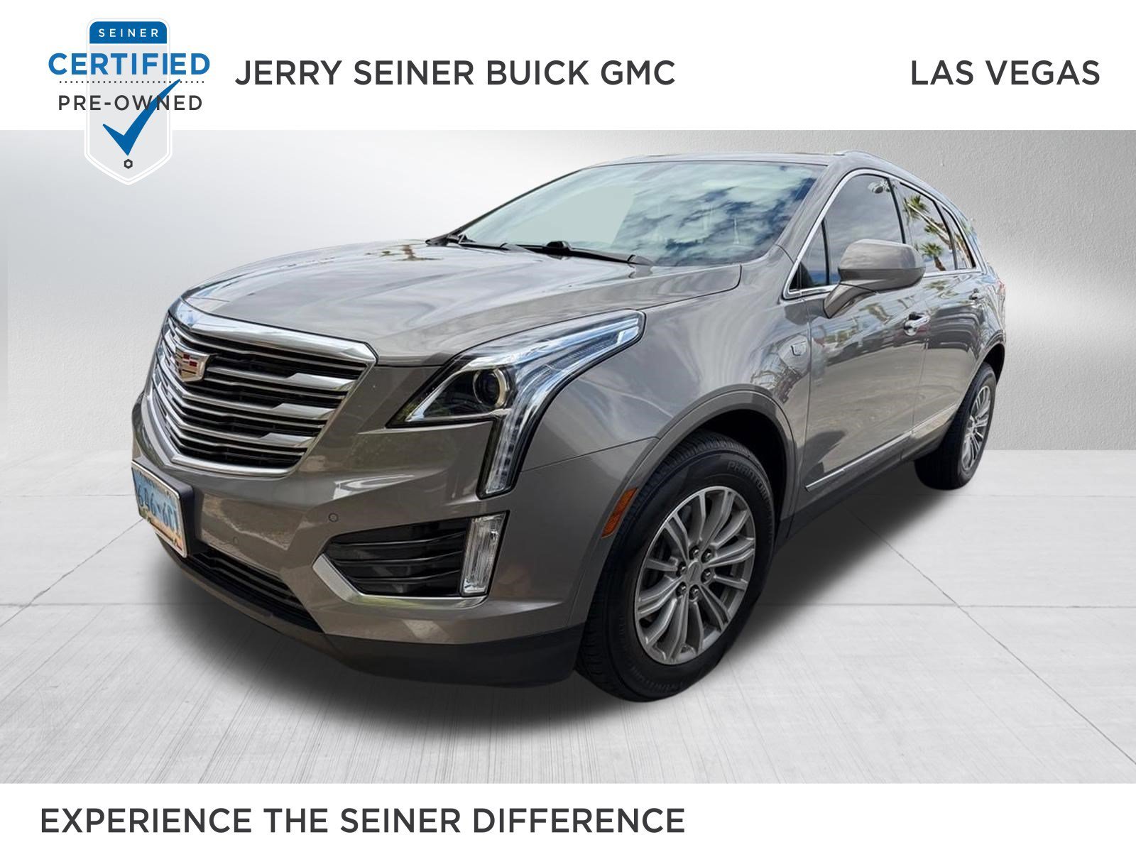 Used 2018 BRONZE DUNE METALLIC Cadillac Luxury AWD image 1
