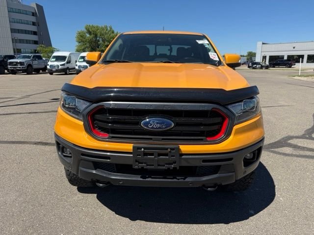 Used 2022 Orange Ford Lariat Tremor image 5
