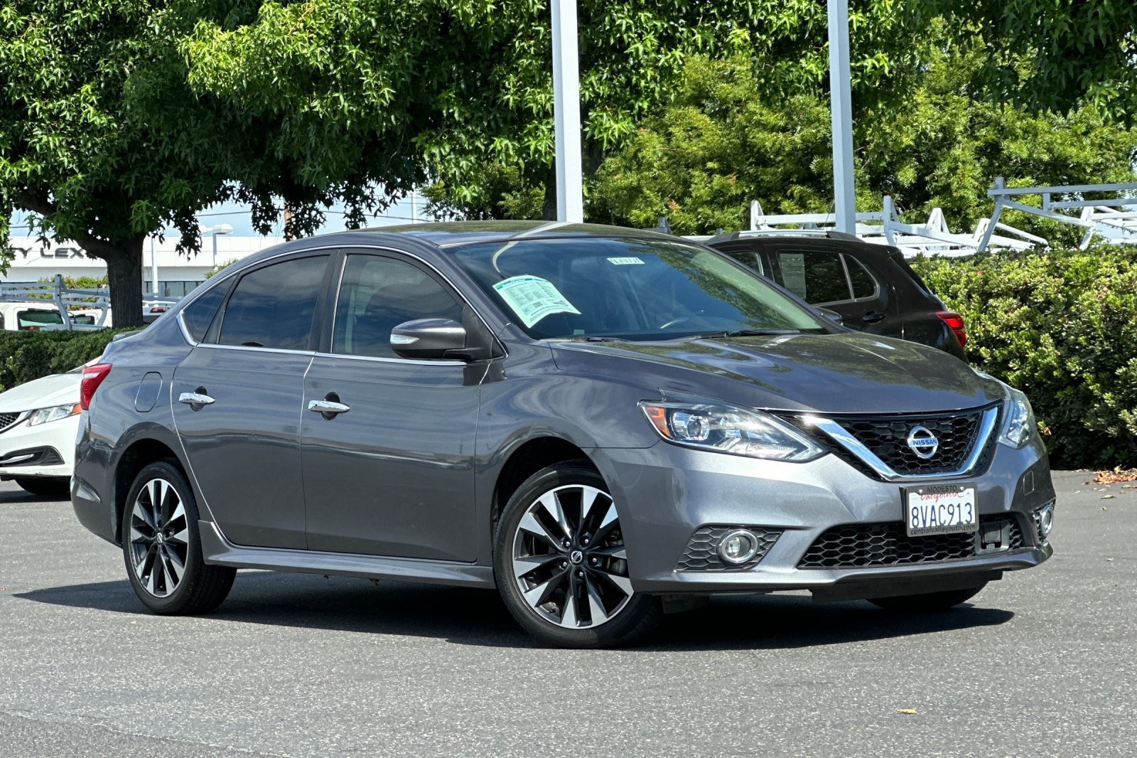 Certified Used 2019 Gun Metallic Nissan SR image 2