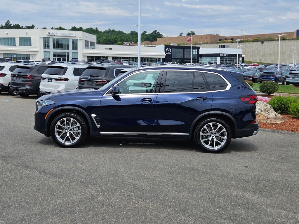 Used 2026 Tanzanite Blue II Metallic BMW xDrive40i image 4