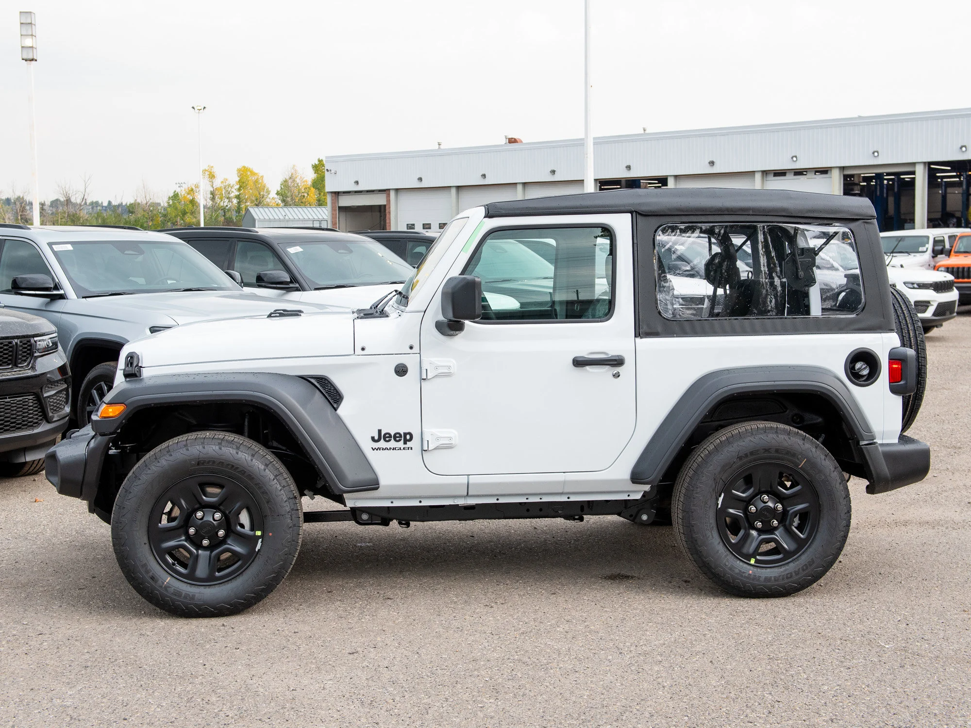 Used 2025 White Jeep Sport* 2 Door, Soft Top 4x4 image 2