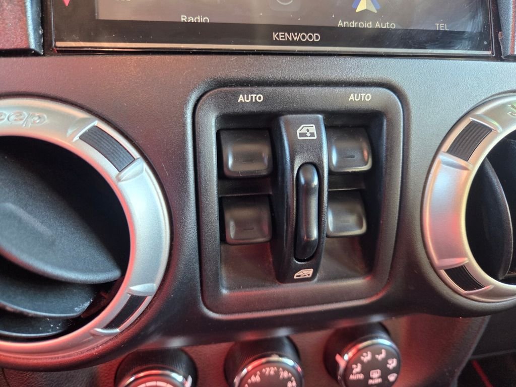 Used 2015 Red Jeep Unlimited Sahara image 23