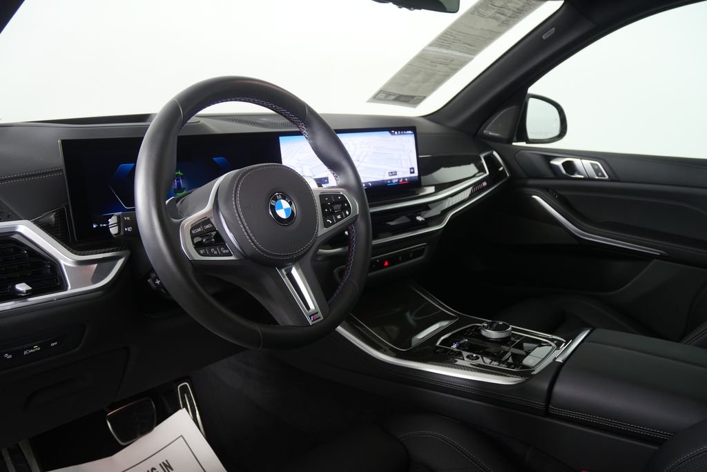 Certified Used 2026 Black Sapphire Metallic BMW M60i image 11