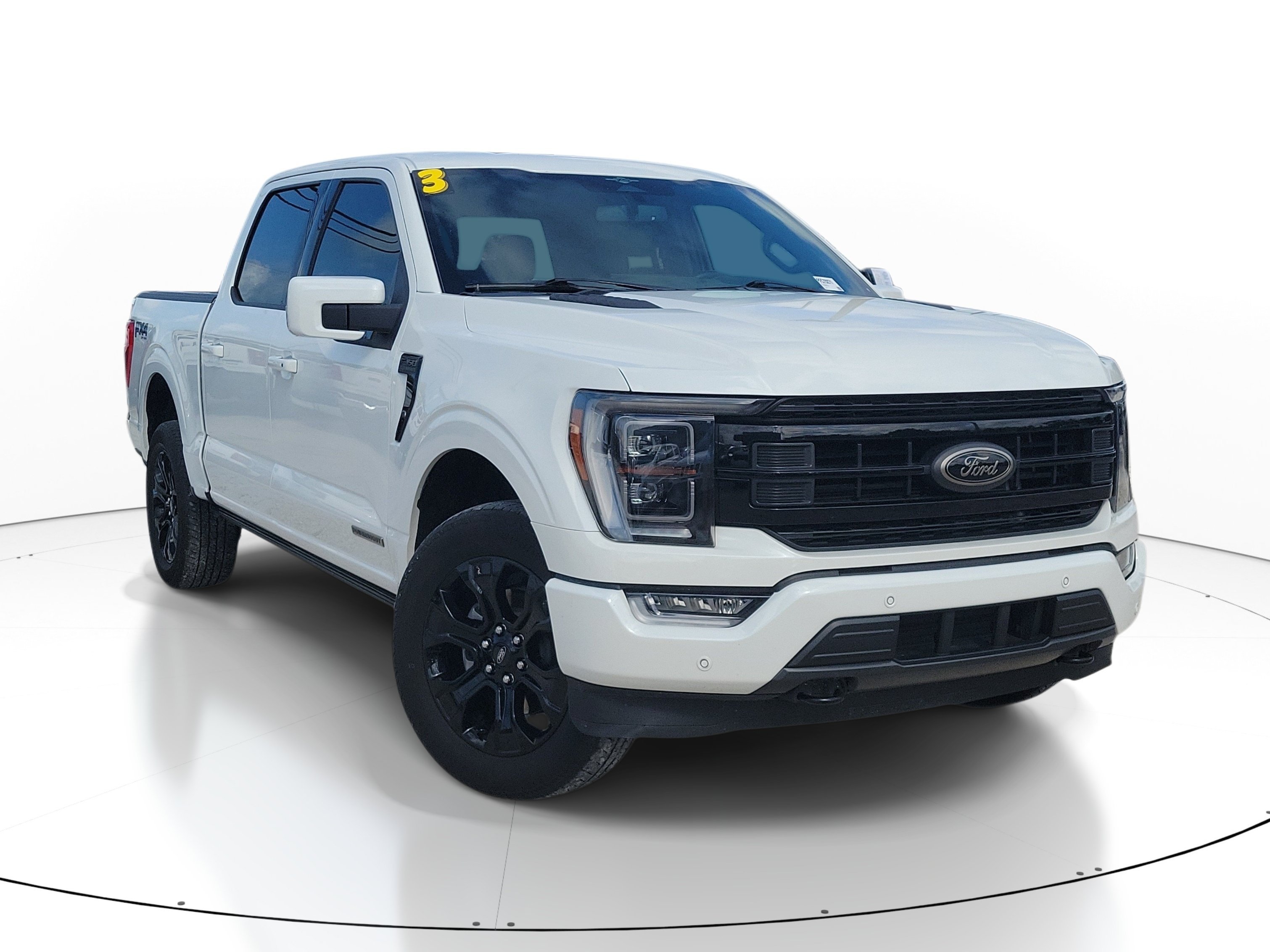 Used 2023 White Metallic Ford LARIAT image 1