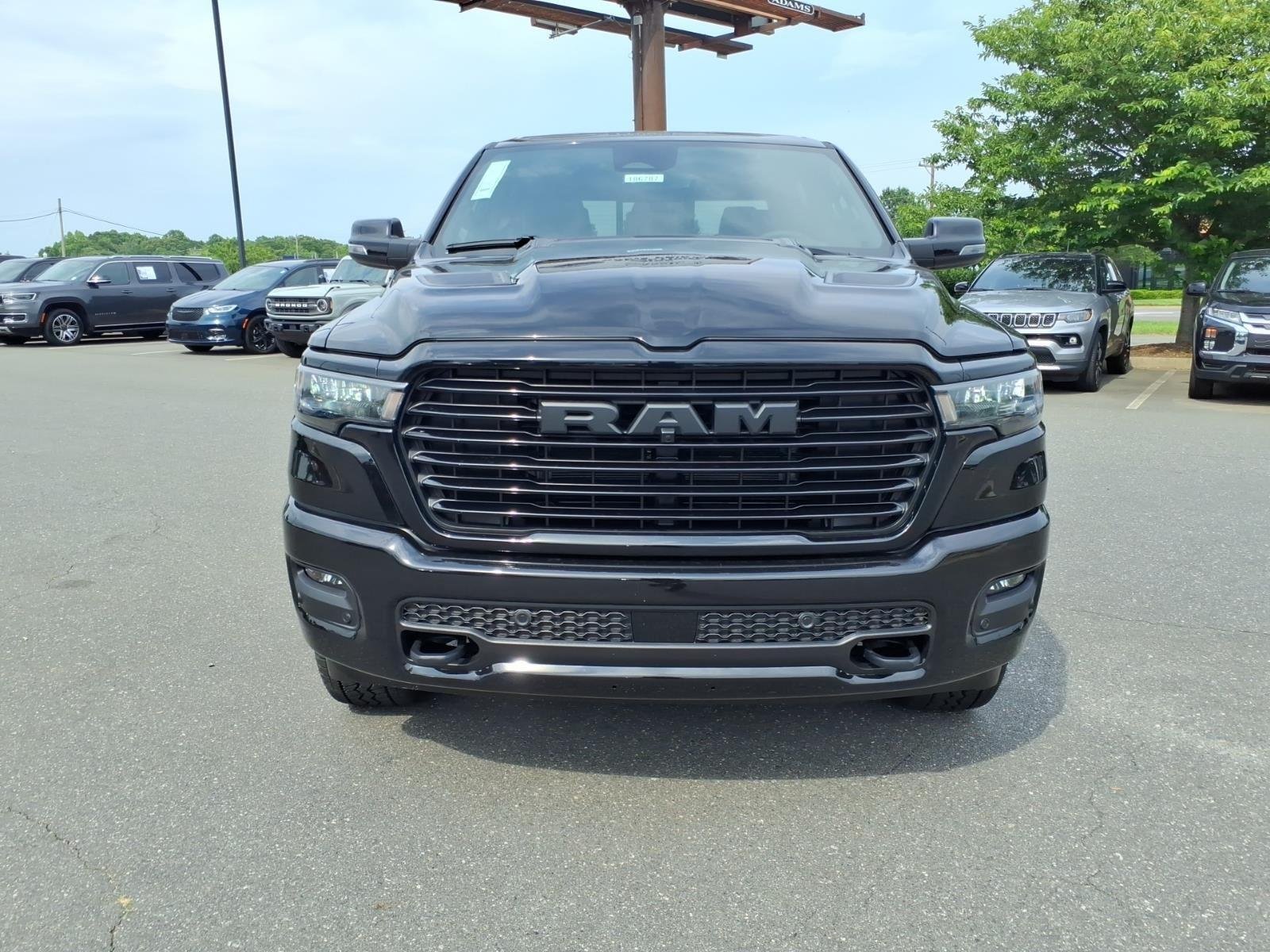 New 2026 Diamond Black Crystal Pearl-Coat Exterior Paint RAM Laramie image 13