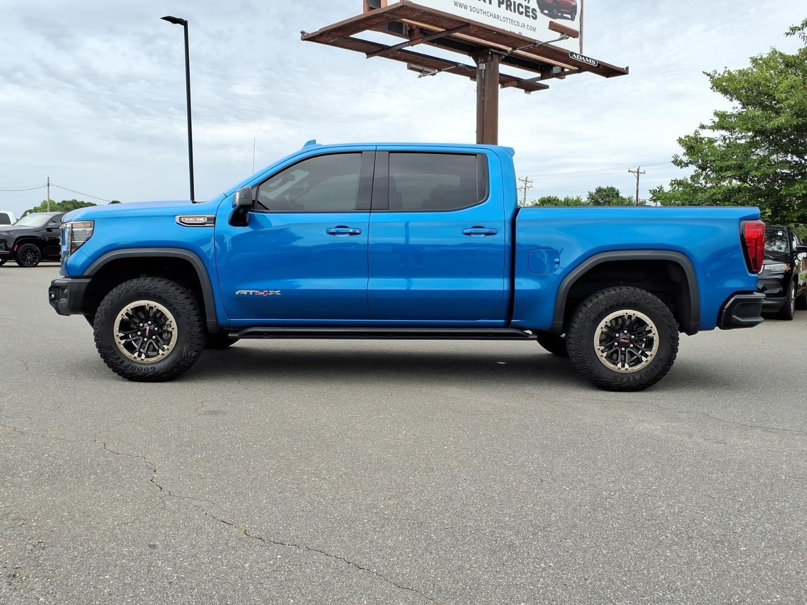 Used 2024 Dynamic Blue Metallic GMC AT4X image 3