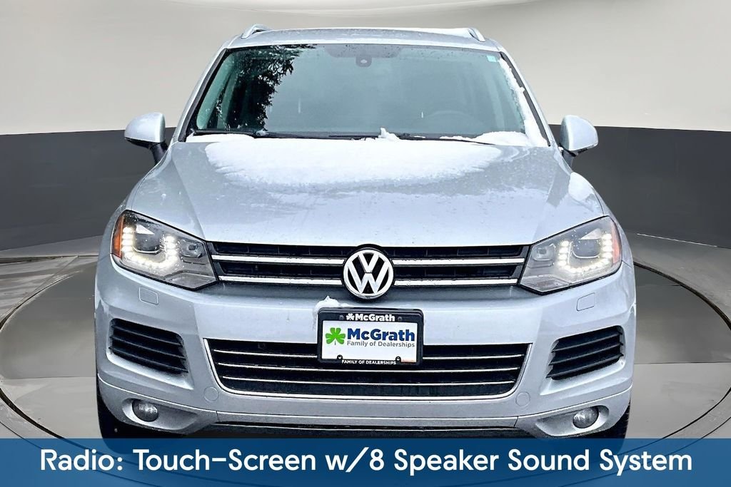 Used 2013 Volkswagen Touareg Sport with VIN WVGEF9BP2DD002555 for sale in Cedar Rapids, IA