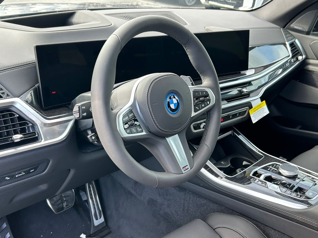 New 2026 Tanzanite Blue II Metallic BMW xDrive50e image 13