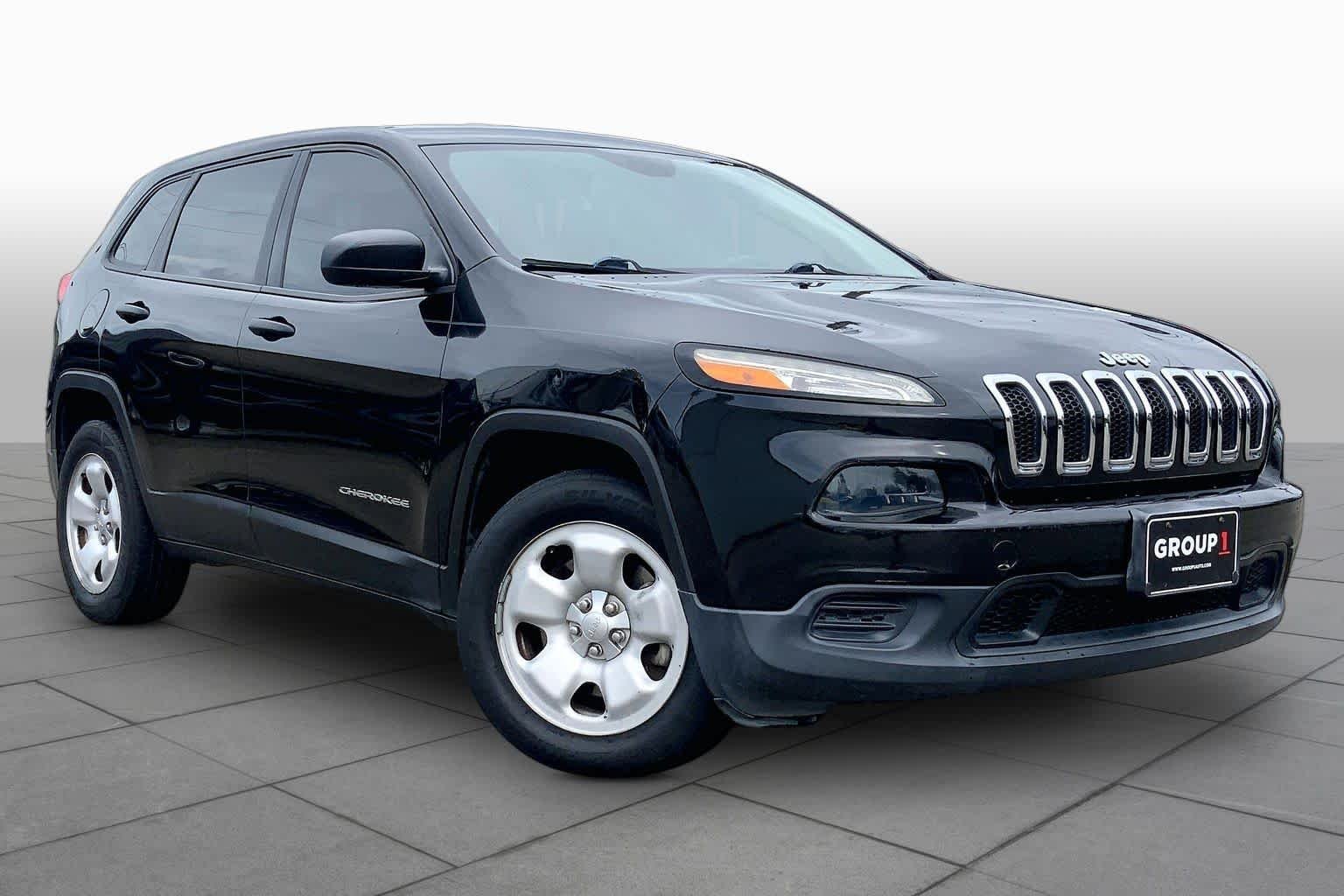 Used 2014 Brilliant Black Crystal Pearlcoat Jeep Sport image 2