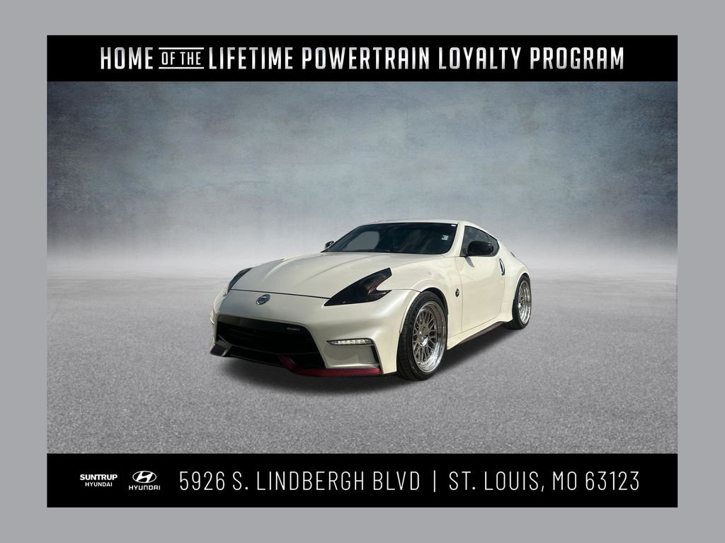 Used 2019 Pearl White Nissan Nismo image 1