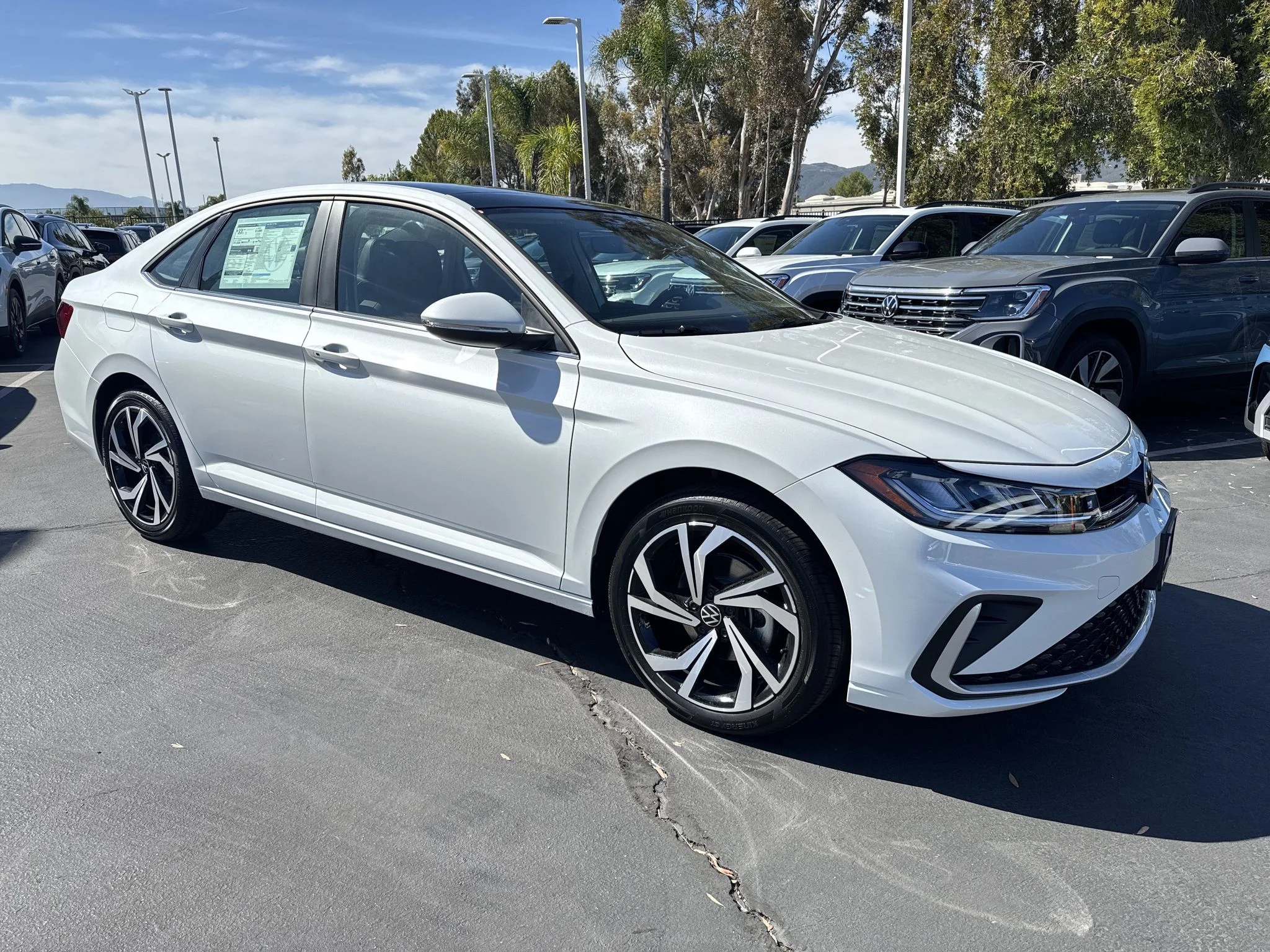 New 2026 Opal White Pearl Volkswagen SEL image 2
