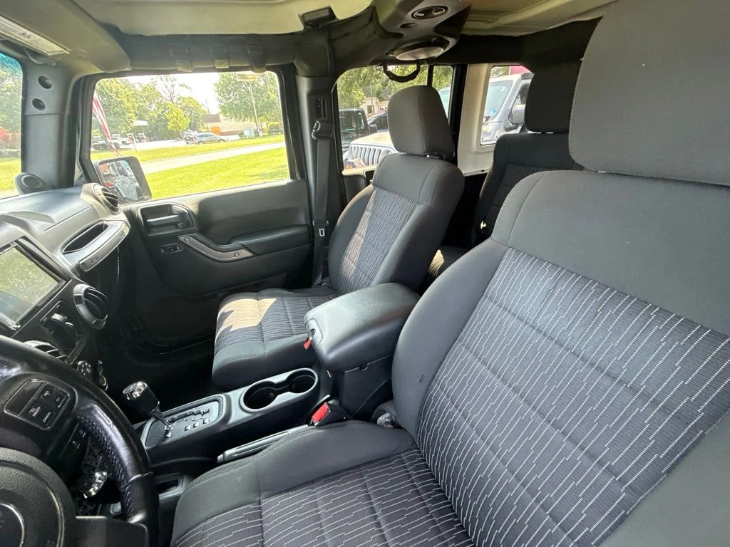 Used 2012 Black Jeep Unlimited Sport image 16