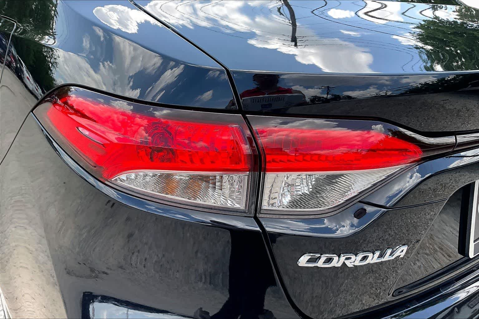 Used 2025 Midnight Black Metallic Toyota Hybrid LE image 27