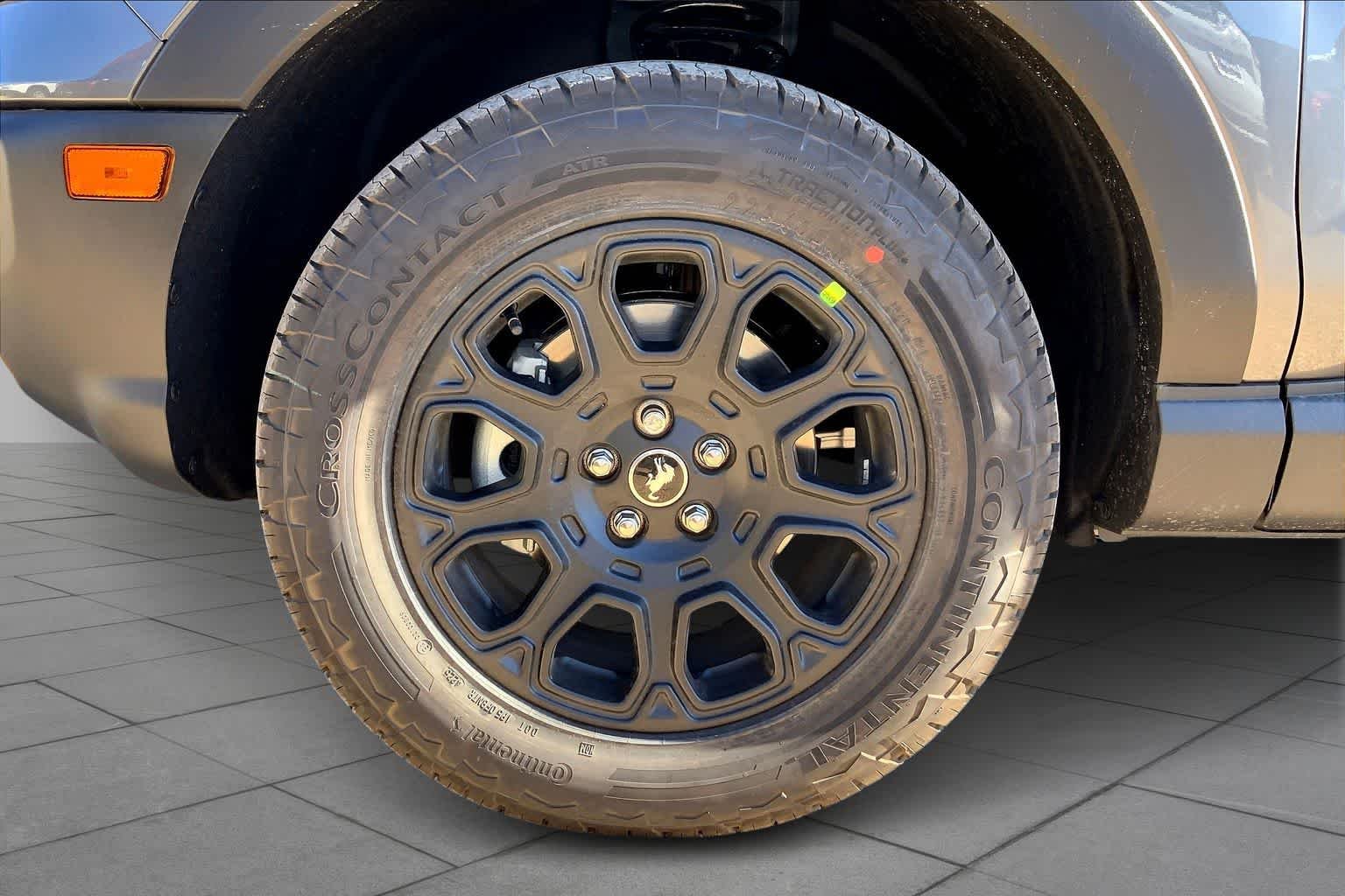 New 2025 Carbonized Gray Metallic Ford Badlands image 11