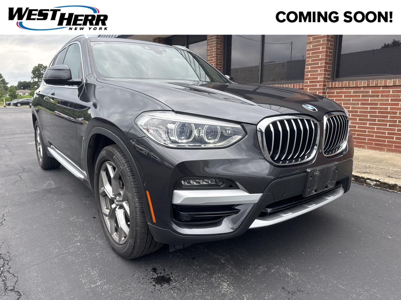 Used 2021 Dark Graphite Metallic BMW xDrive30i image 1