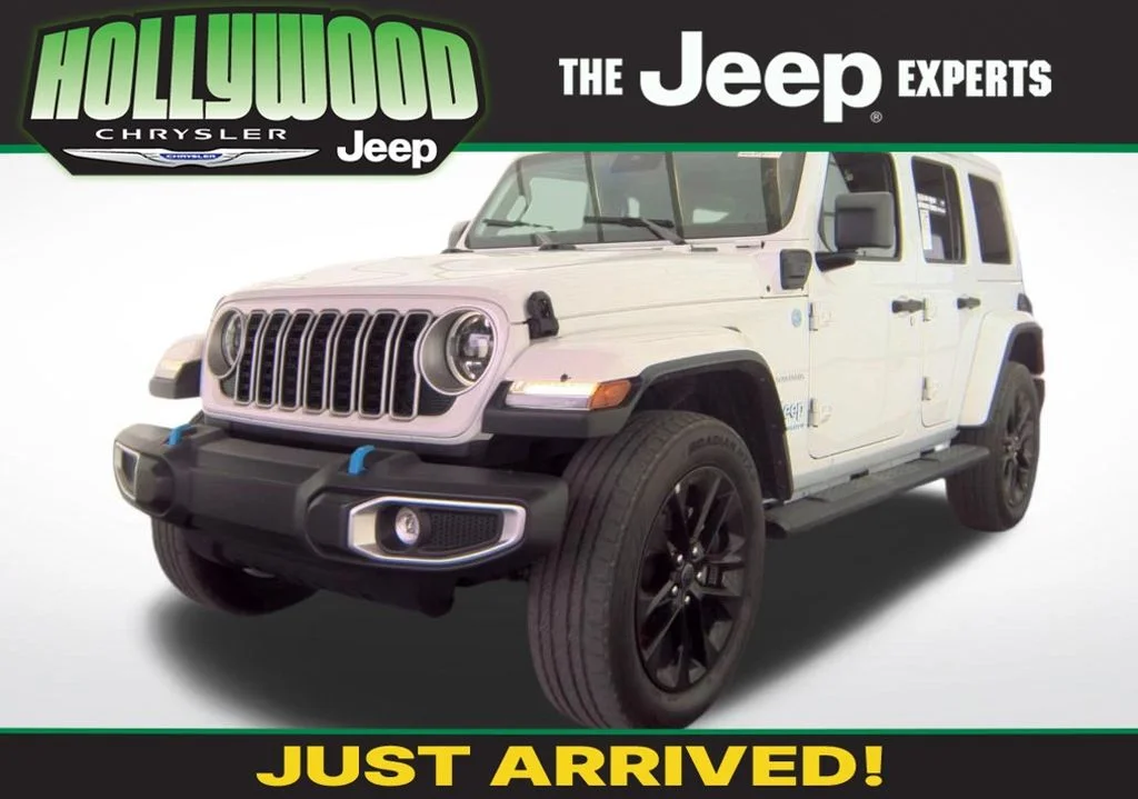 Used 2024 White Jeep Sahara 4xe image 1