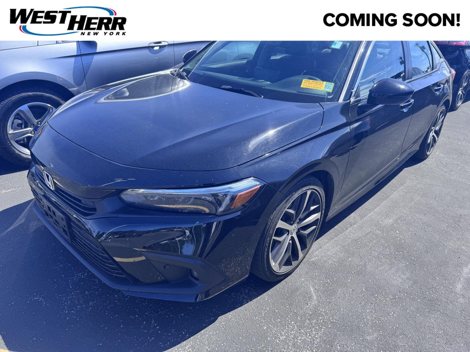 Used 2023 Crystal Black Pearl Honda Touring image 1