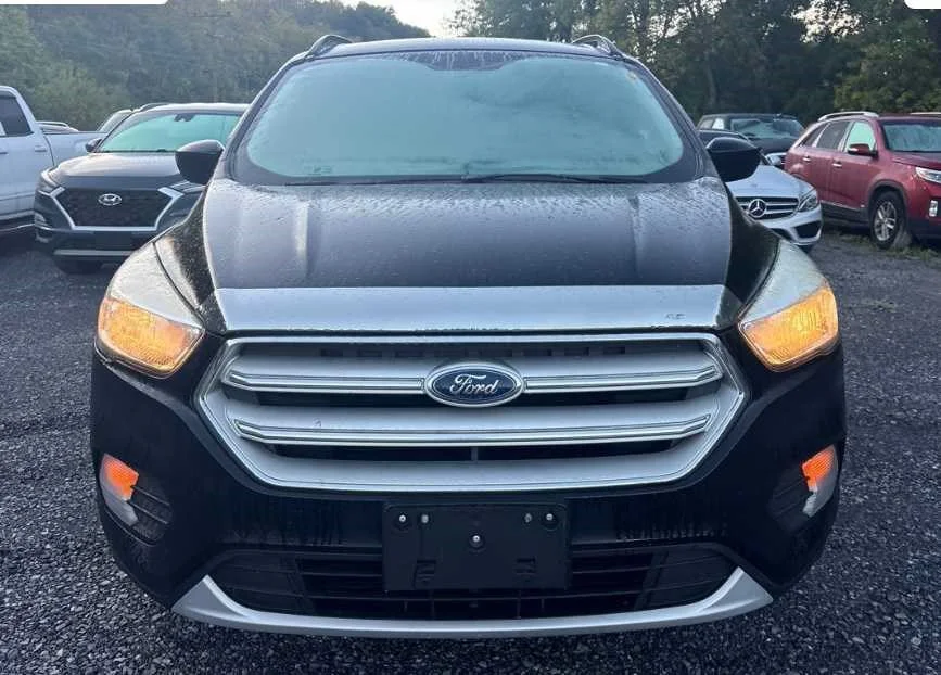 Used 2018 Ford Escape SE with VIN 1FMCU9GD3JUA29058 for sale in Brooklyn Park, MN