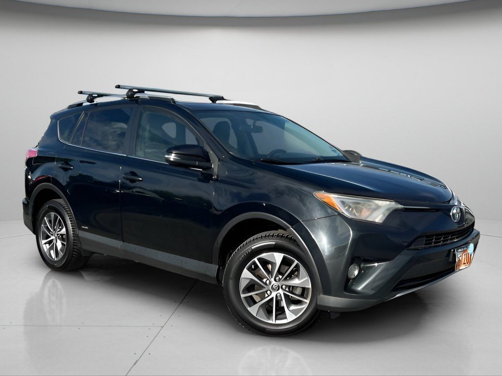 Used 2016 Toyota RAV4 XLE with VIN JTMRJREV1GD033864 for sale in Woods Cross, UT