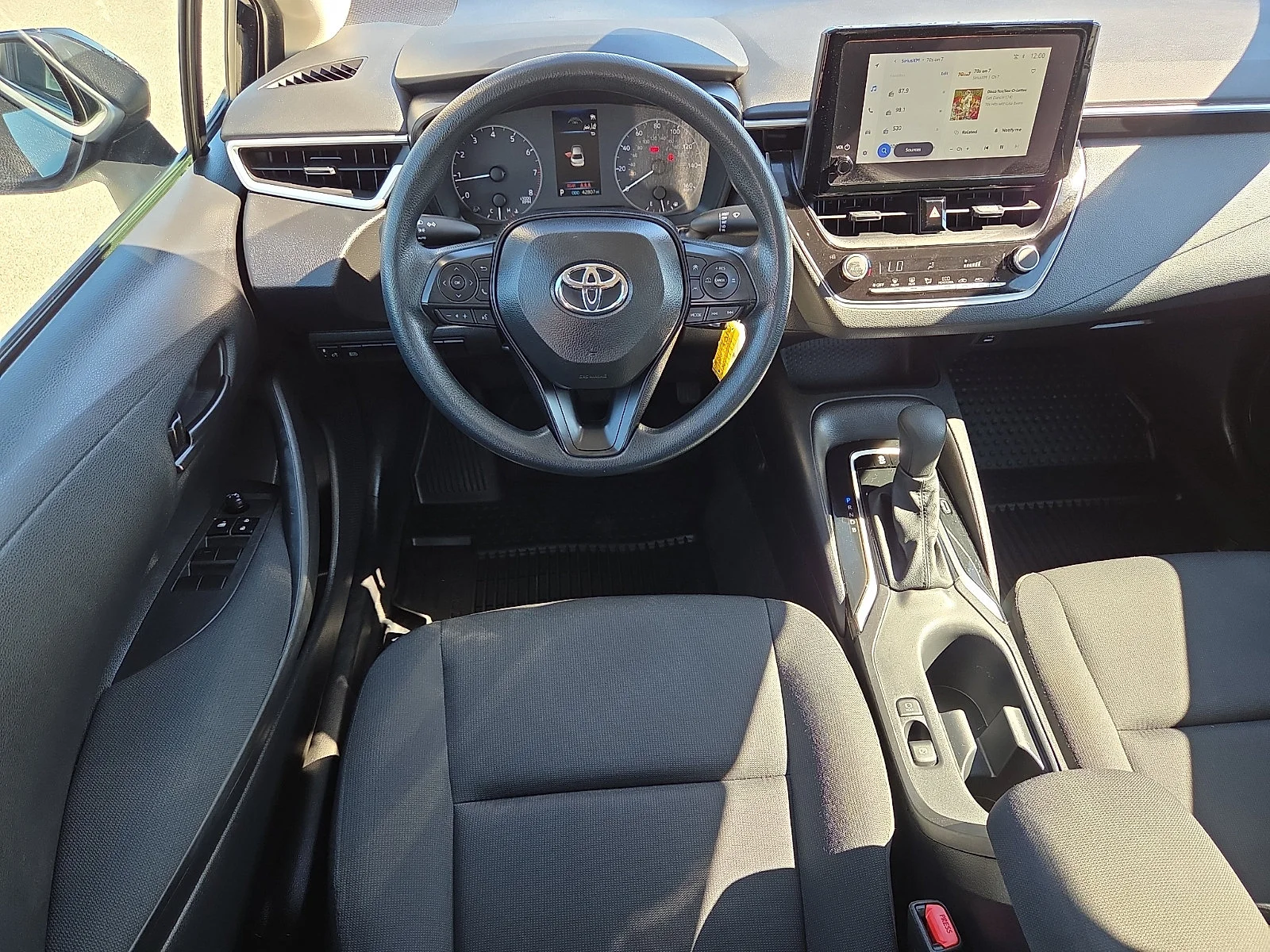 Used 2025 Midnight Black Metallic Toyota LE image 11