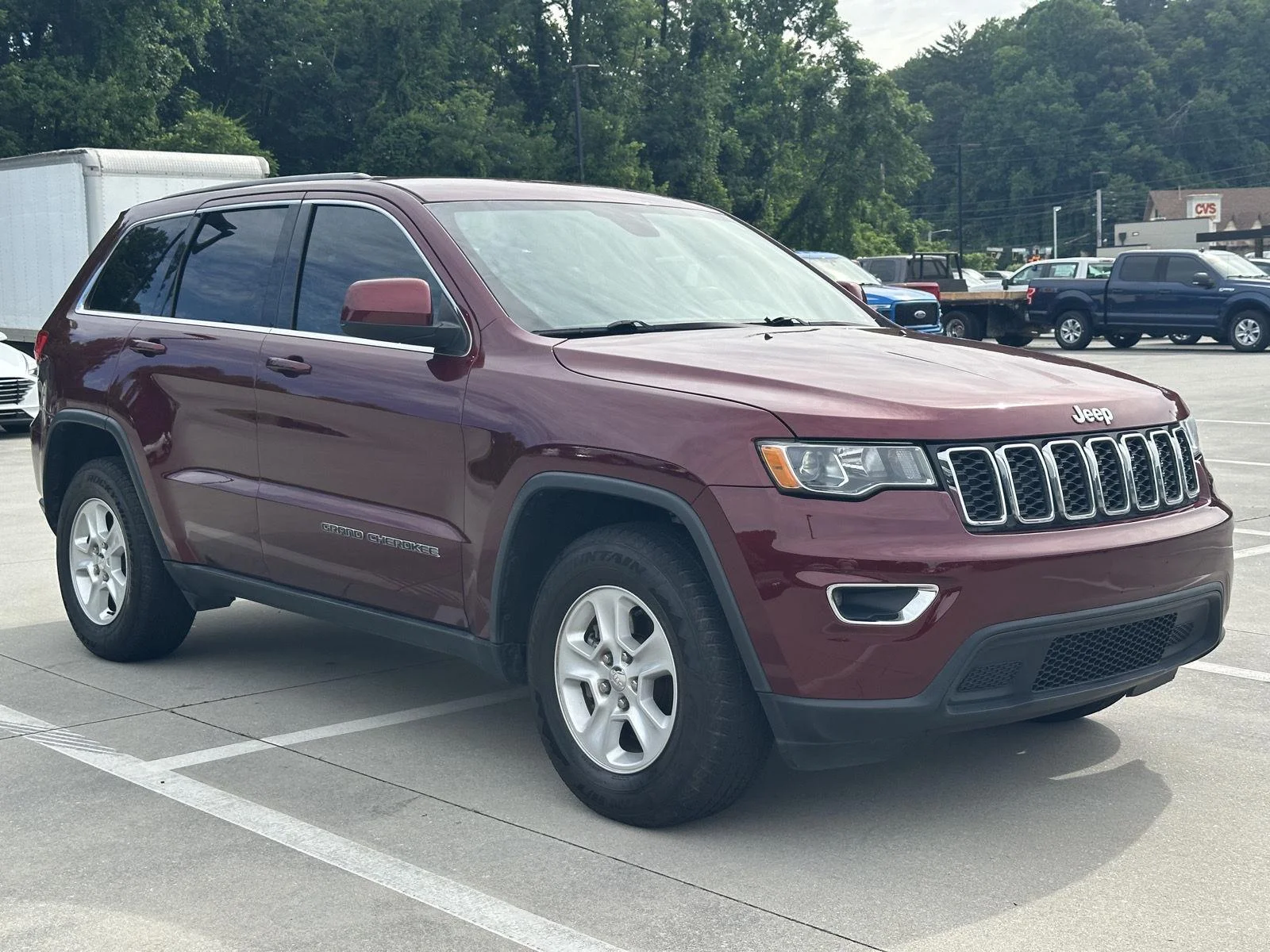 Used 2017 Velvet Red Pearlcoat Jeep Laredo image 1