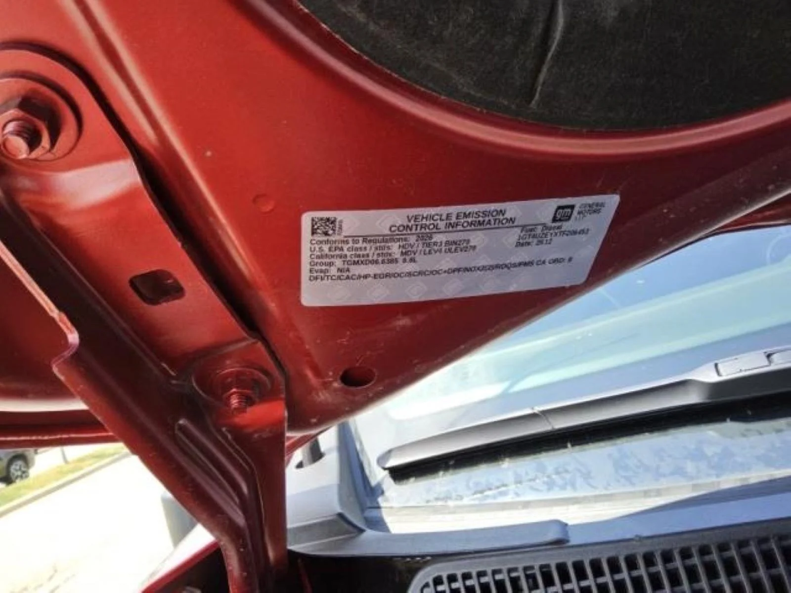 Used 2026 Volcanic Red Tintcoat GMC AT4X image 10