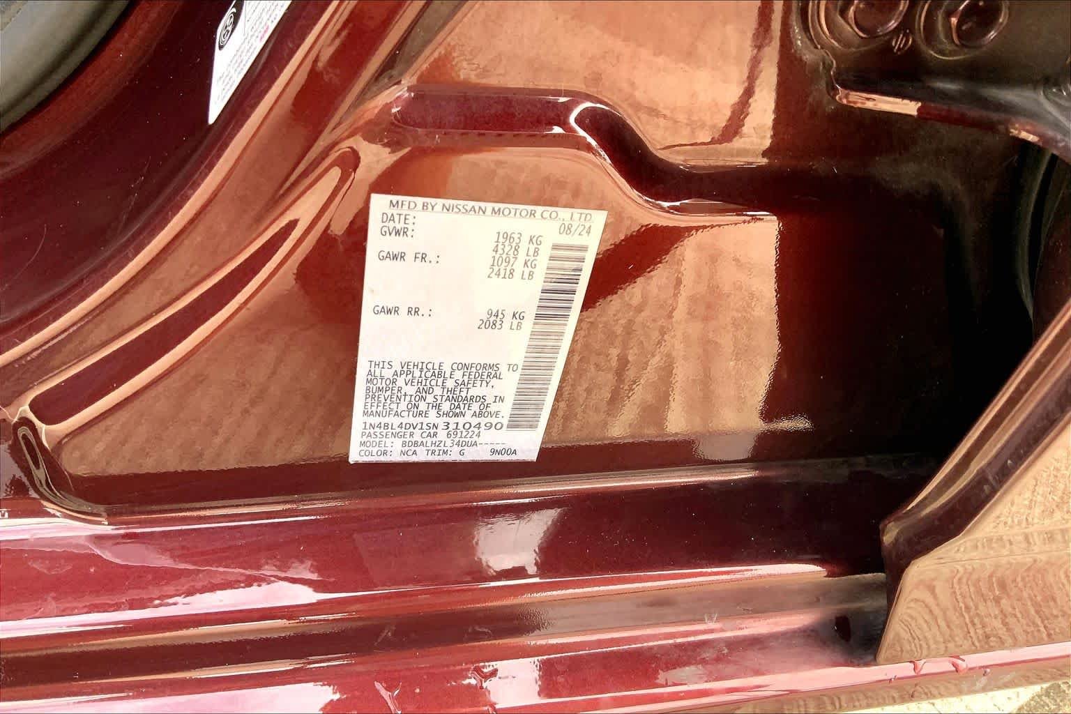 Used 2025 Garnet Pearl Metallic Nissan SV image 31
