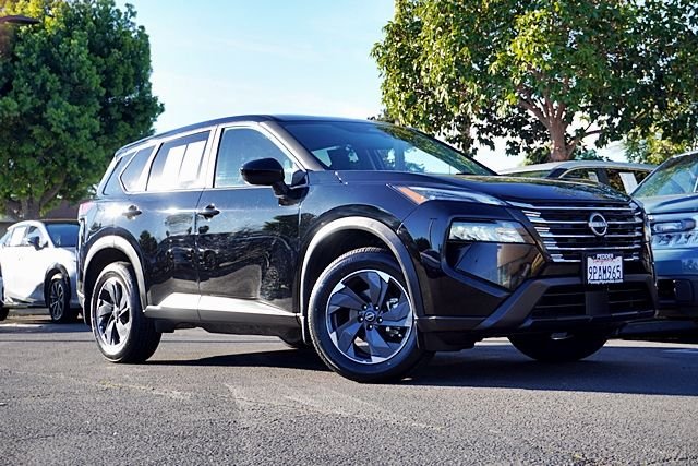 Used 2024 Black Nissan SV image 1