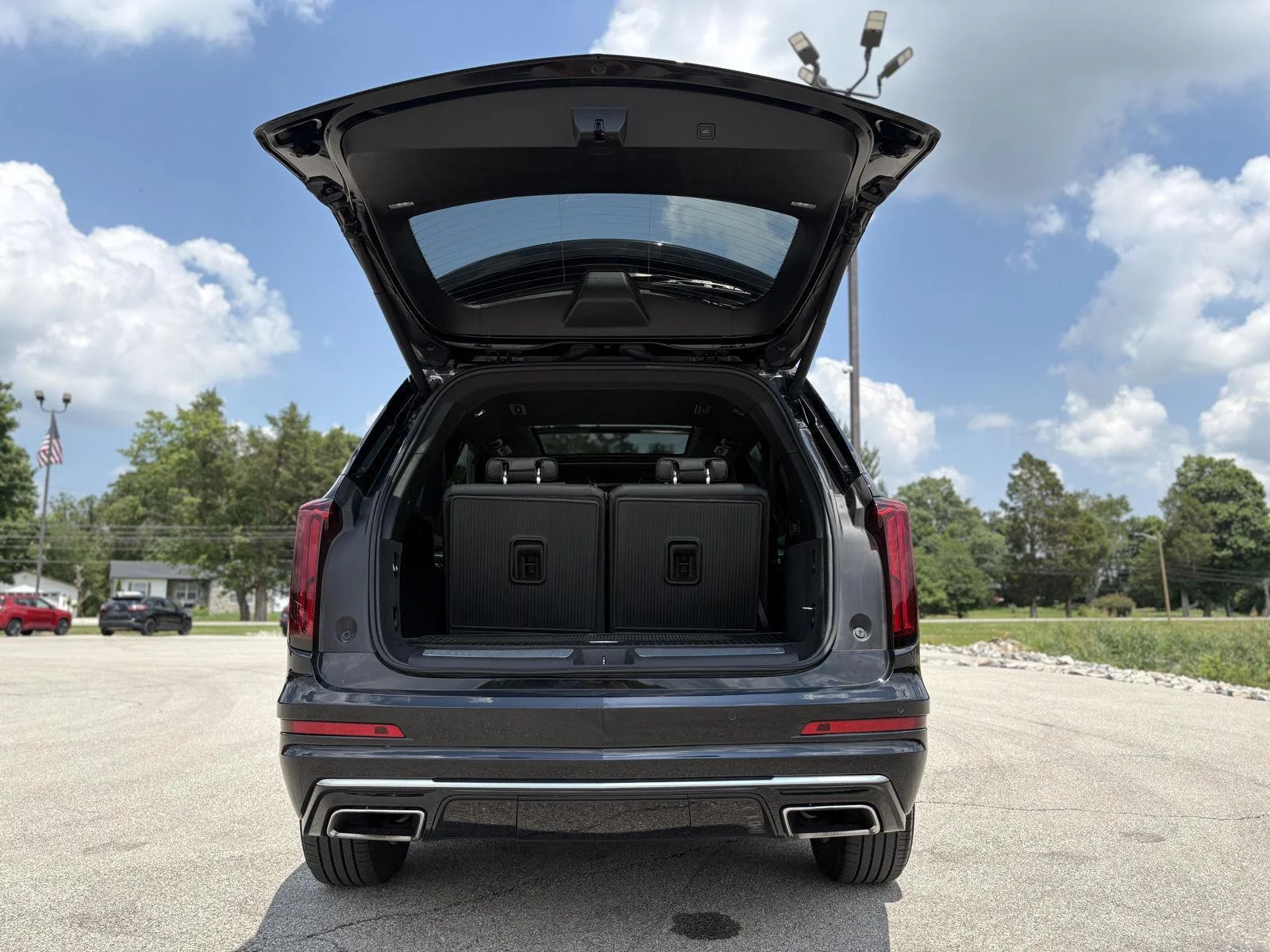 Used 2024 Stellar Black Metallic Cadillac AWD Luxury image 18