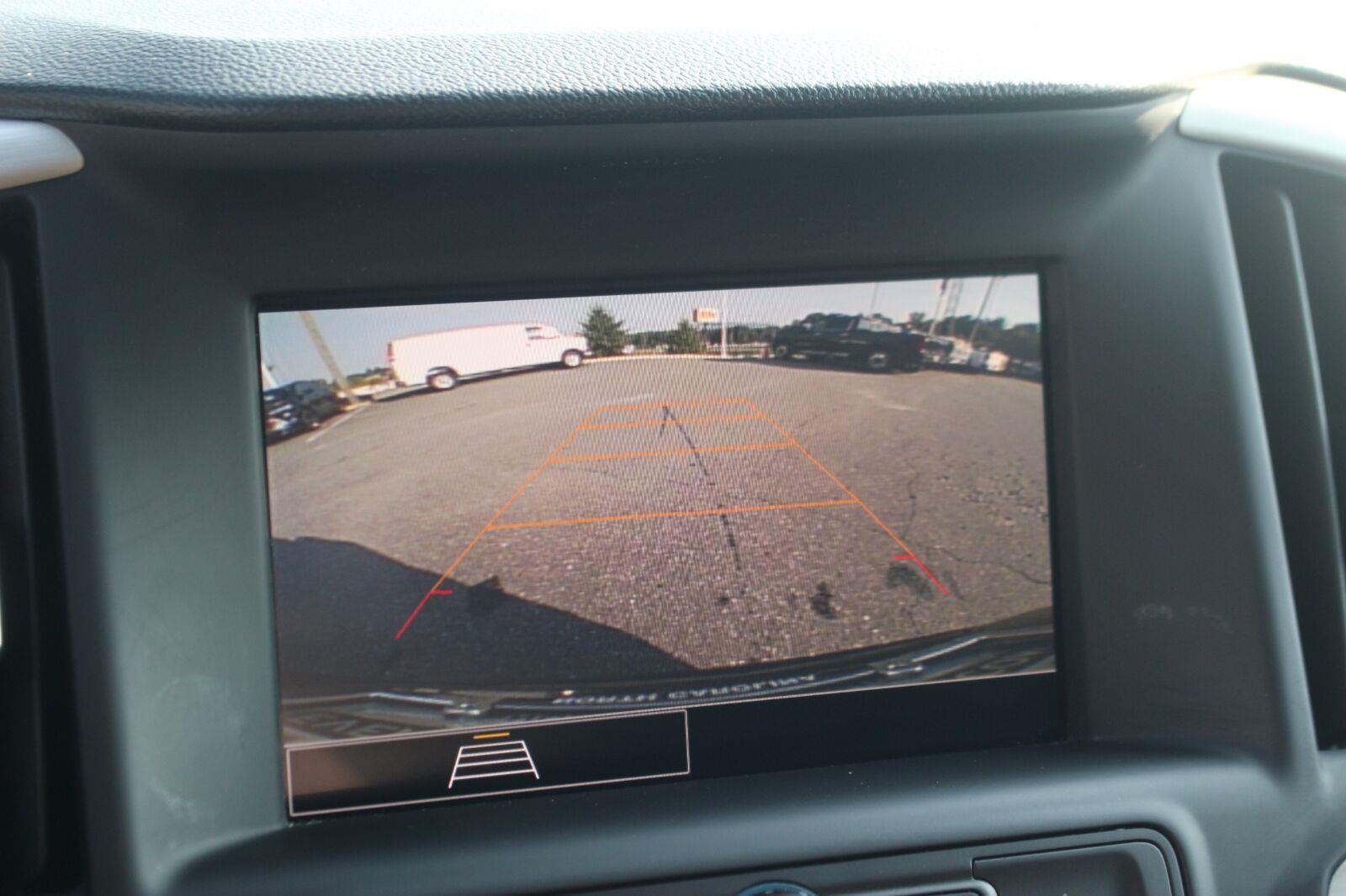 Used 2024 Ebony Twilight Metallic GMC SLE image 25