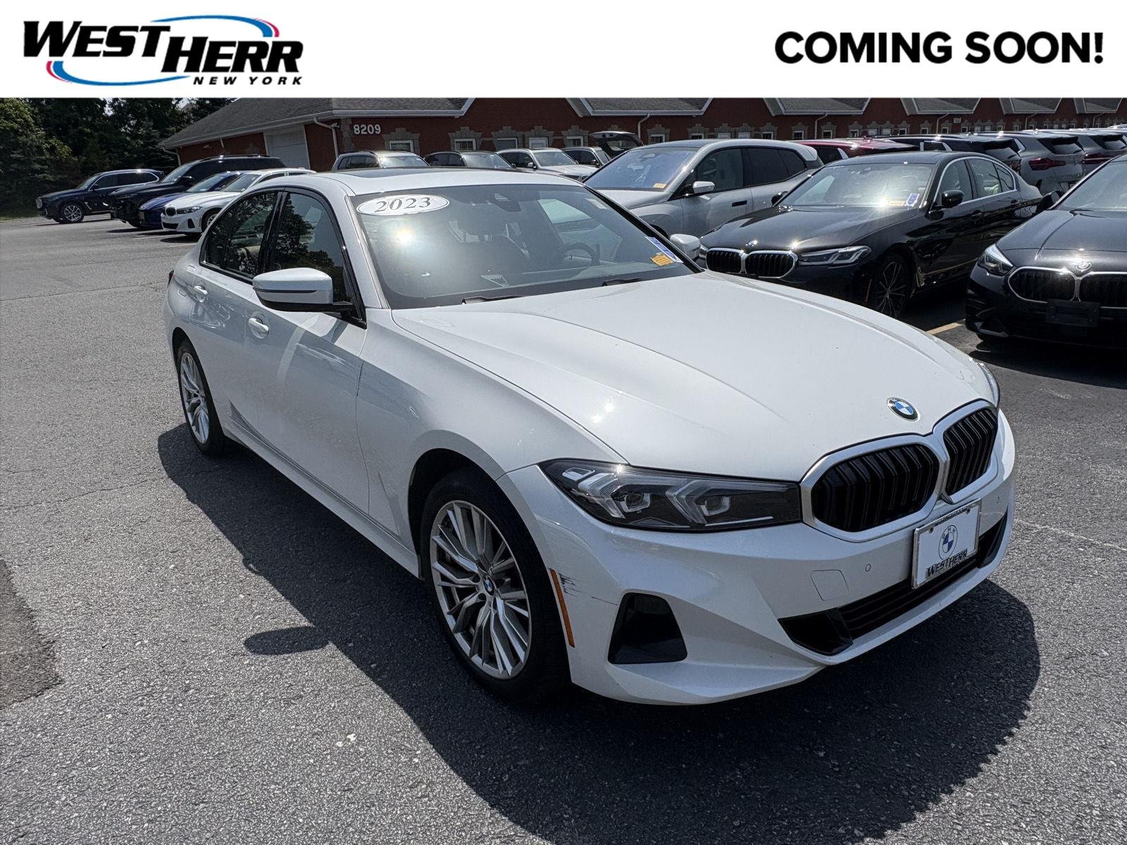 Used 2023 Mineral White Metallic BMW 330i xDrive image 1