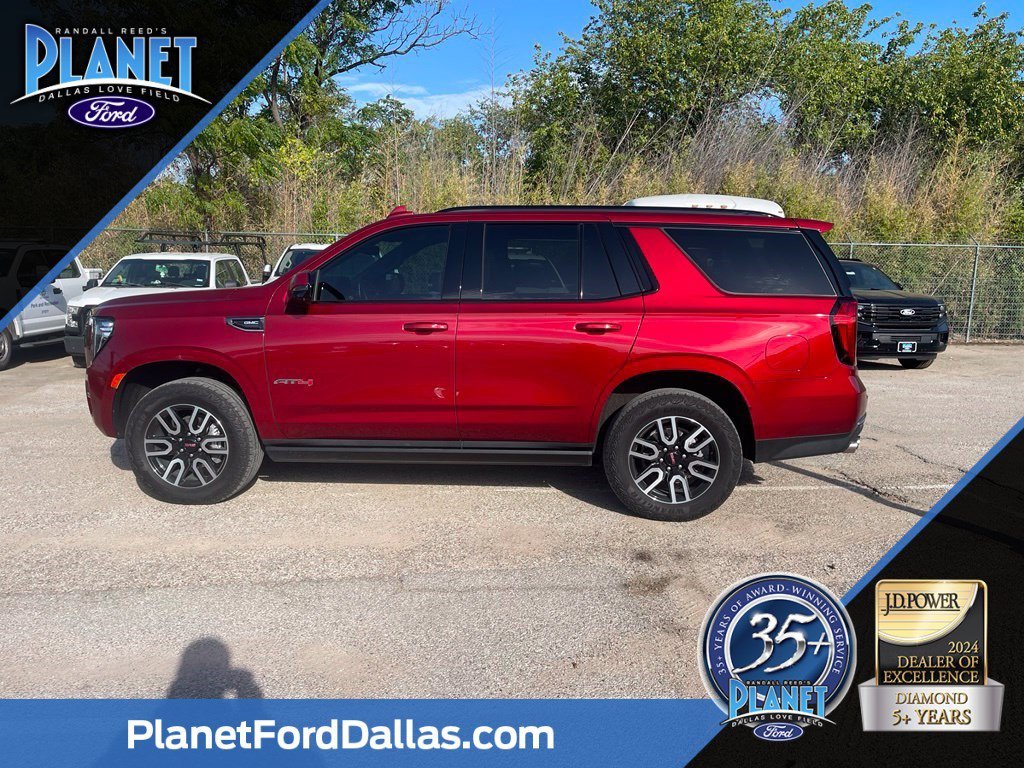 Used 2024 Volcanic Red GMC AT4 image 1
