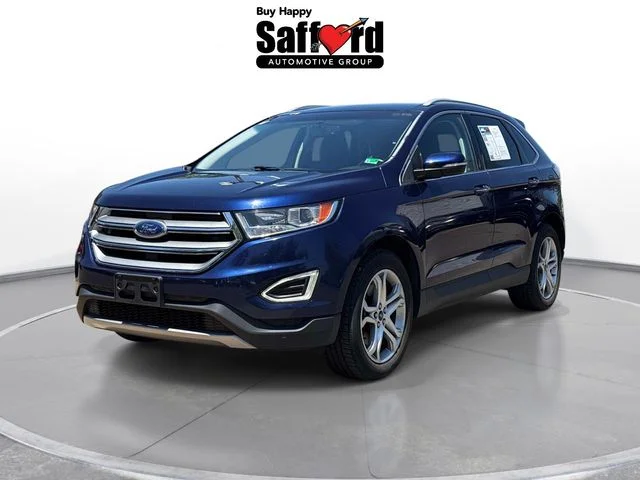 Used 2016 Blue Ford Titanium image 1