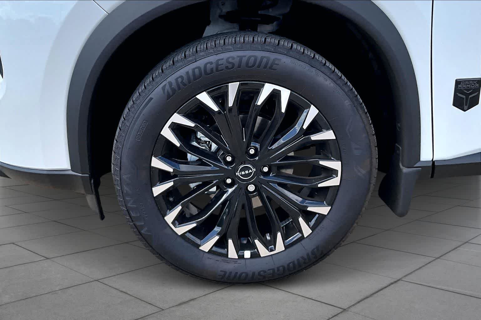 New 2026 Everest White Pearl TriCoat Nissan Dark Armor image 9