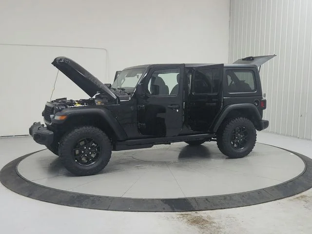 New 2026 Black Clearcoat Jeep Sport image 11