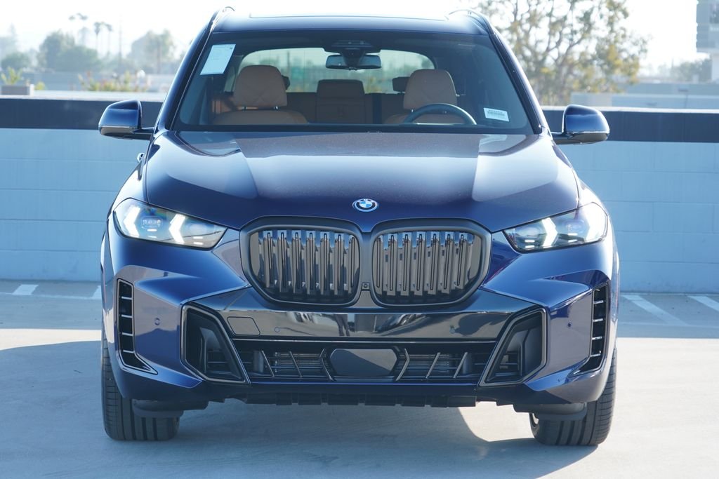 New 2026 Tanzanite Blue II Metallic BMW xDrive50e image 2