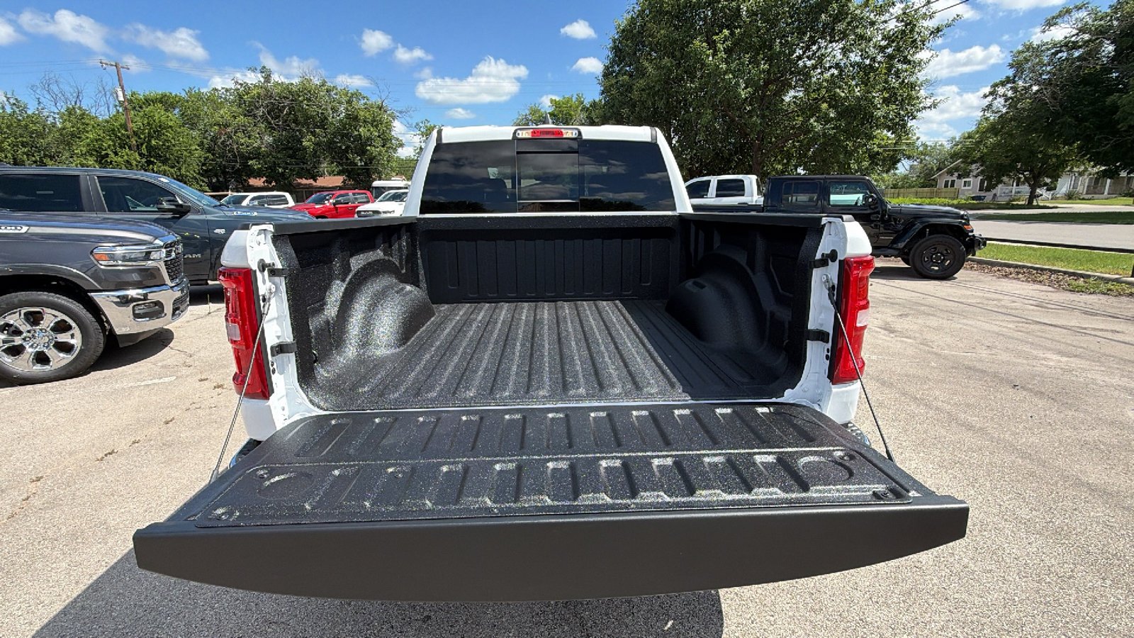 New 2026 Bright White Clear-Coat Exterior Paint RAM Laramie image 24