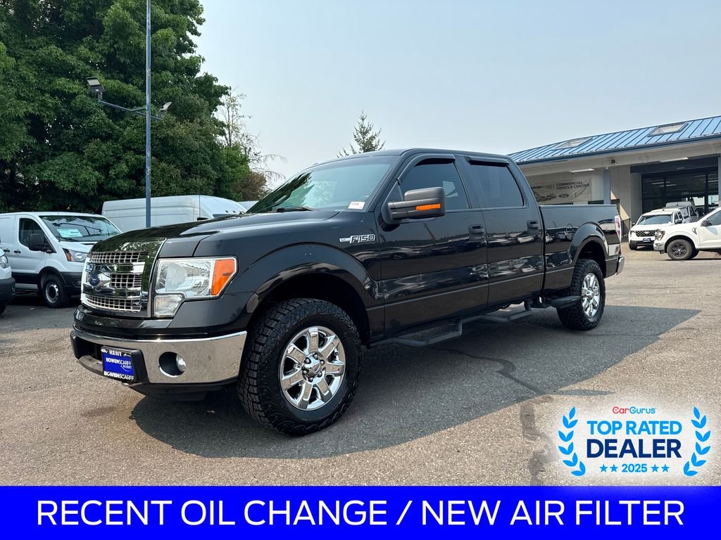 Certified Used 2013 Tuxedo Black Metallic Ford XLT image 1