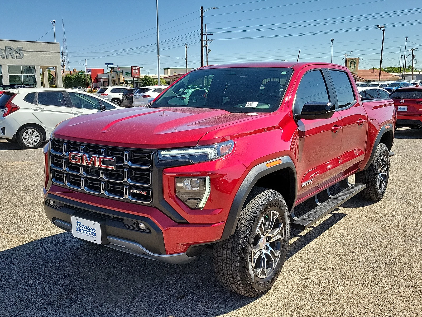 Certified Used 2024 Volcanic Red GMC 4WD AT4 image 4