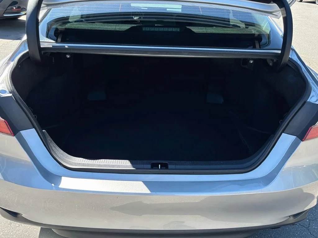 Used 2024 Celestial Silver Metallic Toyota LE image 24
