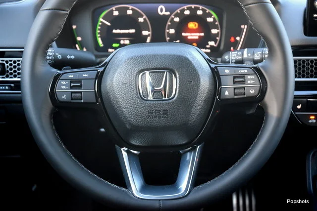 New 2026 Crystal Black Pearl Honda FWD Touring Hybrid image 15