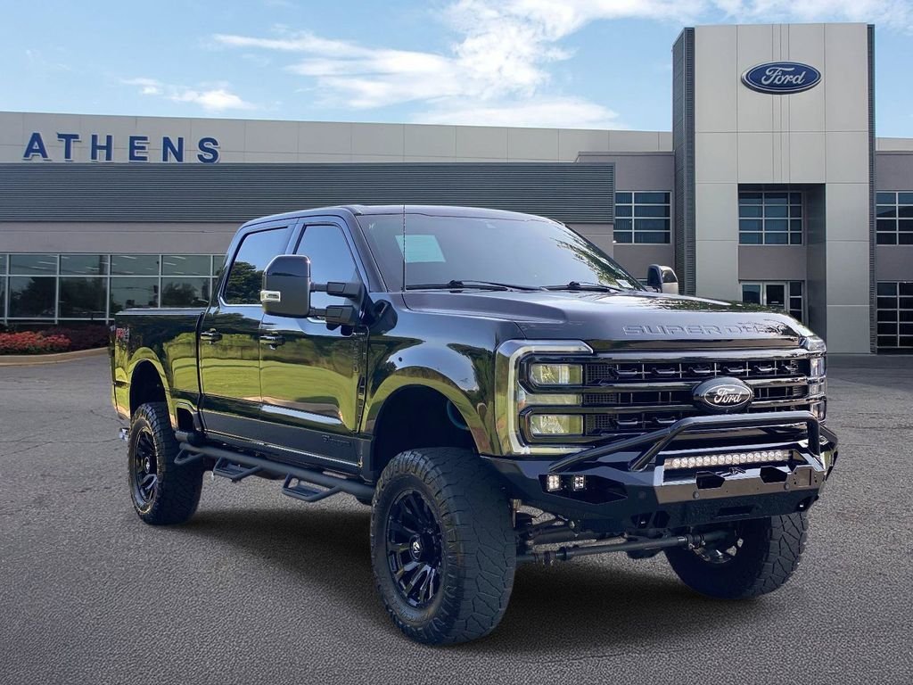 Used 2023 Agate Black Metallic Ford Lariat image 1