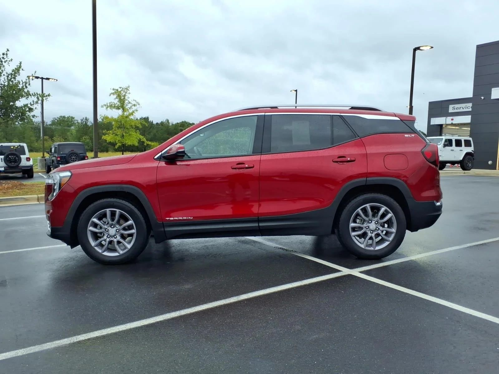 Used 2023 Volcanic Red Tintcoat GMC SLT image 3
